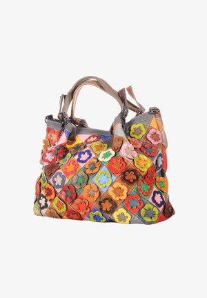 Large handbag with colorful patchwork squares, each adorned with a raised multi-colored flower decoration, and two beige handles.