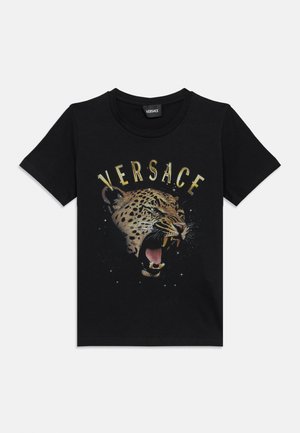 Black cotton t-shirt featuring a large leopard graphic and "VERSACE" text in gold. Round neckline and short sleeves, with a smooth texture.
