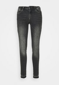 Černé skinny džíny vyrobené z denimu s vybledlým vzhledem, obsahující pět kapes, poutka na opasek a zapínání na zip.