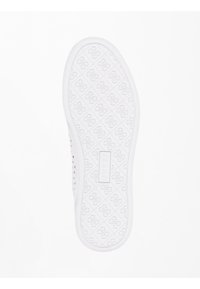 Suola di sneaker bianca con una superficie texturizzata caratterizzata da modelli a diamante e piccoli dettagli del logo, circondata da un bordo liscio.