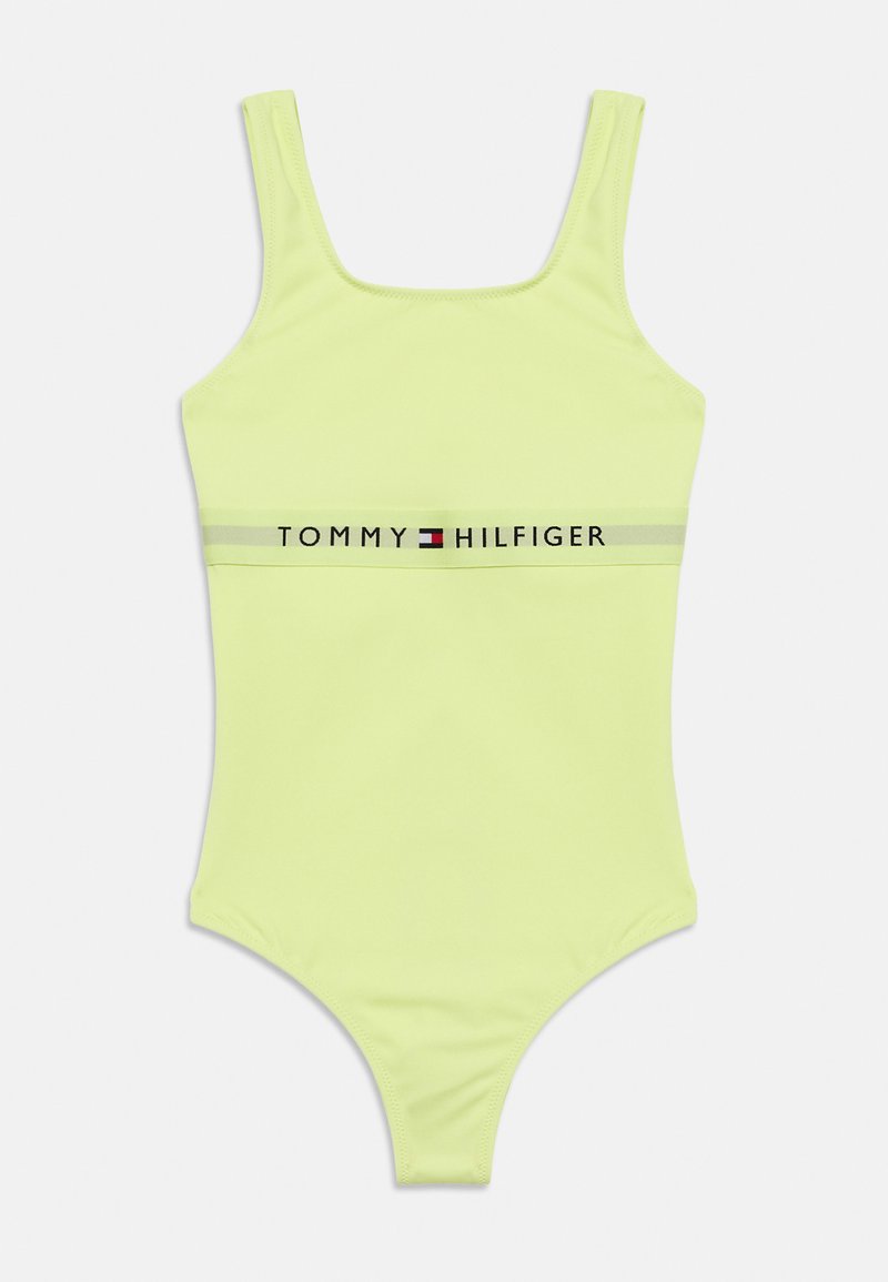 Φωτεινό πράσινο ολόσωμο μαγιό με χοντρές τιράντες στους ώμους και ελαστική ταινία με το εμπορικό σήμα "Tommy Hilfiger" στο στήθος.