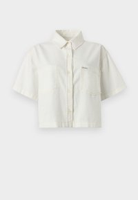 White short-sleeve collared shirt made of cotton, featuring a cropped design, two chest pockets, and a small logo label.