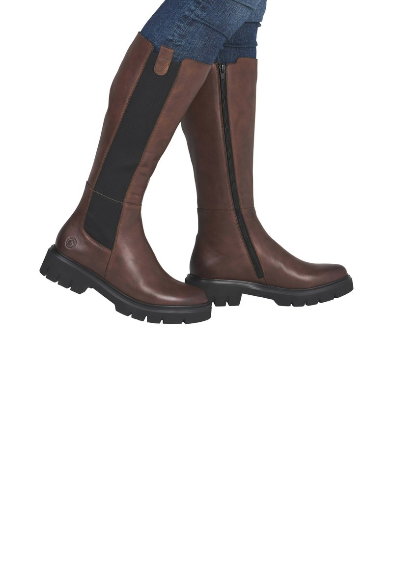 Brown leather knee-high boots with black elastic side panels, zip closure, and textured rubber soles. Solid design with minimal accents.