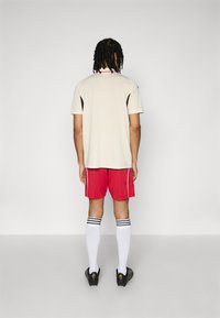 adidas Performance LIVERPOOL FC 25/26 HOME SHORTS - Klupska odjeća - strawberry red