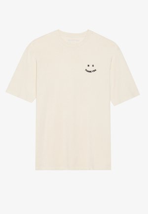 T-shirt di cotone color crema con maniche corte, con testo ricamato in nero "NO THANK YOU" in un design curvo sul petto.