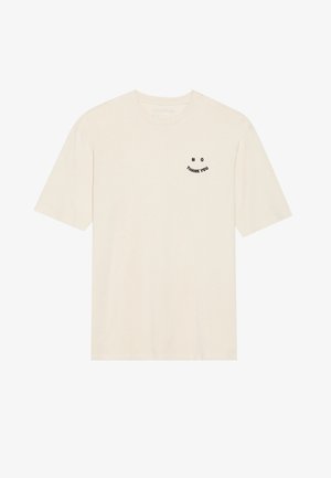 Cream-colored cotton t-shirt with short sleeves, featuring black embroidered text "NO THANK YOU" in a curved design on the chest.