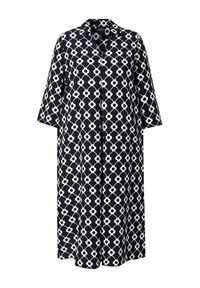 Długa czarna sukienka z białym okrągłym wzorem, z kołnierzykiem i rękawami do połowy łokcia, wykonana z lekkiego materiału.