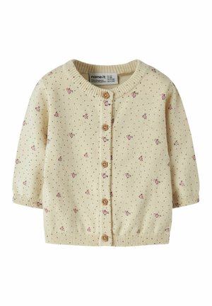 Cardigan bébé crème avec motif floral rose, boutons marron en forme de fleurs, et poignets et ourlet côtelés, taille 1-2 mois.
