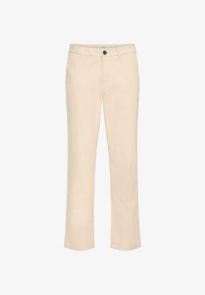 Beežid puuvillased püksid sirge sääremudeliga, esikinnis nööpidega ja tavaliste vööaasadega. Sile tekstuur ja ühevärviline muster.