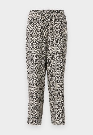 Black and cream patterned pants. Features an elastic waistband and a repeating geometric design with diamonds and floral motifs.