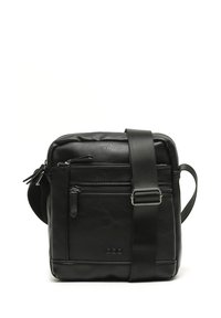 Borsa a tracolla in pelle nera con tasca frontale con zip e tracolla regolabile. Caratterizzata da una superficie liscia e un design minimalista.