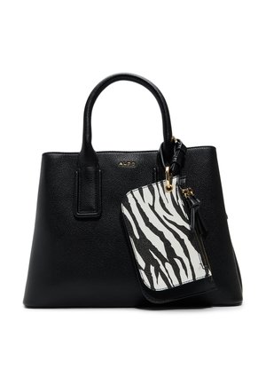 Czarna torebka ze skóry o fakturze z dwoma uchwytami oraz odpinaną czarno-białą saszetką w zebrowy wzór, przymocowaną złotym zapięciem.