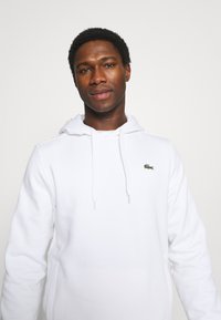 Lacoste Sweatshirt com capuz - white