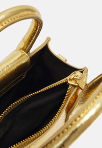 PARFOIS CROSSBODY BAG ROCKY S - Håndveske - gold-coloured