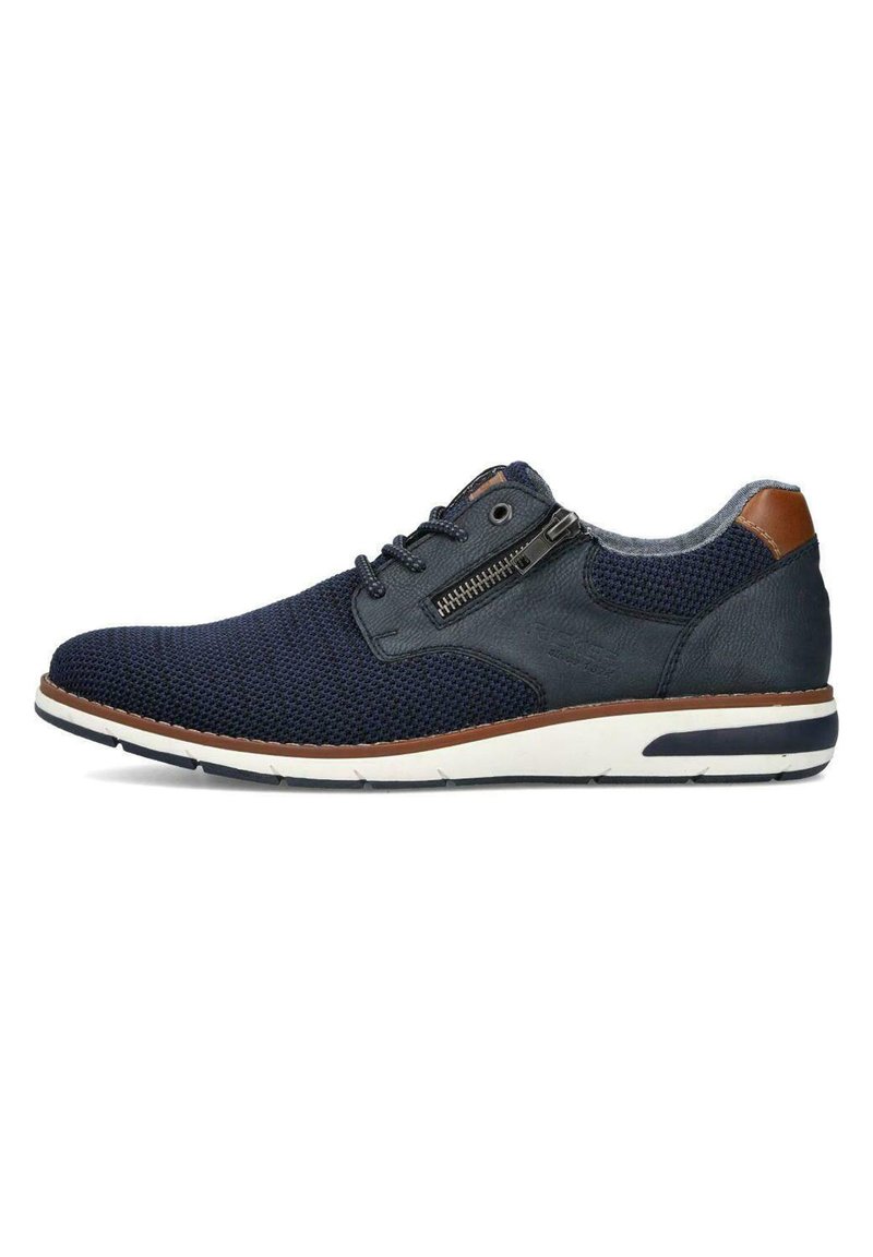 Sneakers blu navy con tomaia in tessuto testurizzato, dettagli in pelle, cerniera laterale e suola in gomma bianca con dettagli blu scuro.