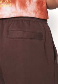 Nike Sportswear Trainingsbroek - beige