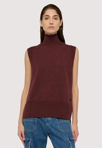 Burgunderfarbener ärmelloser Rollkragenpullover mit geripptem Struktur und breitem Saum. Aus gestricktem Material gefertigt und mit einem dezenten Logo-Akzent versehen.
