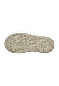 Gummisohle in hellbeige mit strukturierten Oberflächen, die verschiedene Größen von rechteckigen Mustern und geprägtem Text aufweist.