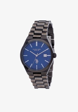 Orologio in acciaio inossidabile nero con quadrante rotondo blu, indicatori delle ore in argento, display della data alle 3, e bracciale a maglie. Logo U.S. Polo Assn. incluso.
