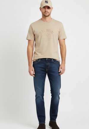 MANGA CORTA ARENA - Camiseta estampada - beige