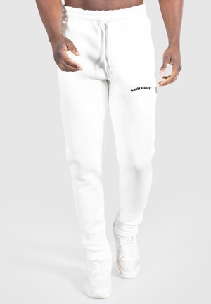 MERRICK - Pantalones deportivos - creme