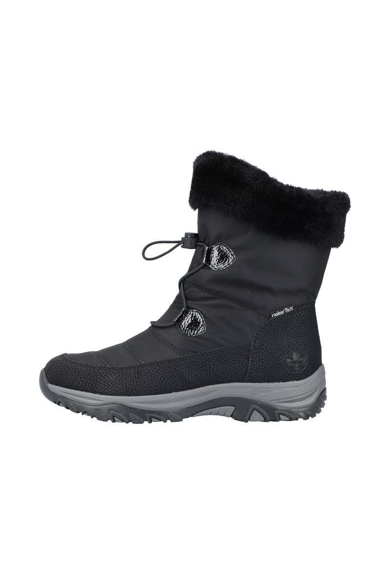 Black winter boot with a textured finish, fur-lined cuff, and gray sole. Features lace toggle and contrasting shiny accents.
