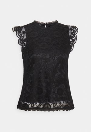 Blusa nera senza maniche in pizzo con motivi floreali, bordi ondulati su maniche e orlo, e una piccola chiusura con bottone sul retro.