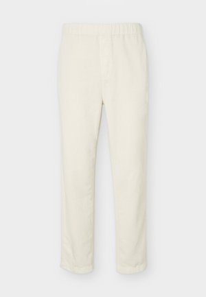 Pantalon droit couleur blanc cassé avec taille élastique et détails minimalistes, présenté sur un fond clair uni.