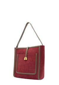 Röd kordflöjel tote-väska med brunt konstläderdetaljer, som har en framficka och ett guldtonat lås. Mediumstor med axelrem.