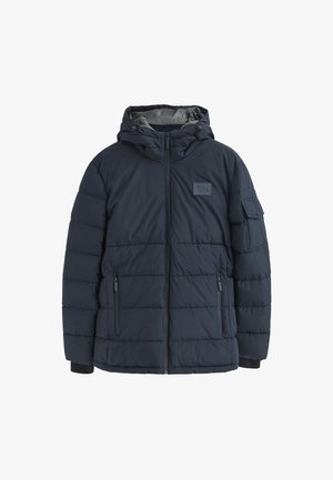 Marineblå pufferjakke med hætte, quiltet design, lynlåslukninger og sidelommer. Har et logo-etiket på brystet og elastiske manchetter.