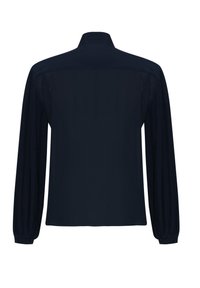 Camicetta a maniche lunghe di un blu navy scuro, con una parte anteriore liscia e maniche plissettate testurizzate con orli a polsino. Design del colletto classico.