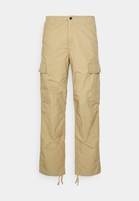 Khaki cargo kalhoty s volným střihem, vybavené dvěma velkými bočními kapsami, knoflíkovým zapínáním a nastavitelnými šňůrkovými lemy. Odolná textilie.