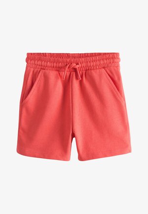 Shorts med koralfarvet elastik i taljen, snøre og forlommer, lavet af blødt stof.