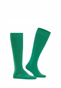 Calze alte fino al ginocchio di un verde brillante, realizzate in un tessuto liscio con dettaglio a costine nella parte superiore e punta senza cuciture per il massimo comfort.