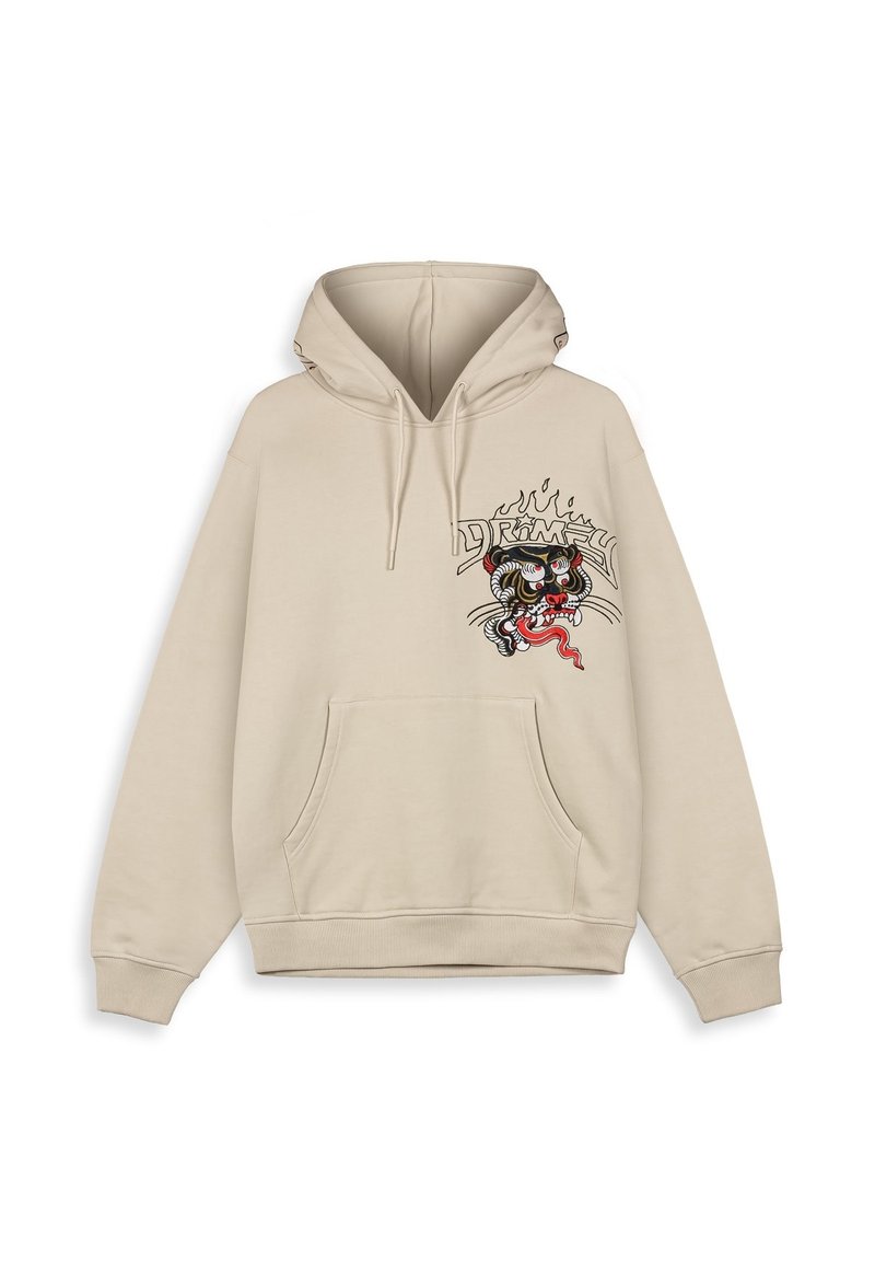 Sudadera beige con un bolsillo frontal, capucha con cordón y un diseño de tigre bordado en el lado izquierdo, con colores y detalles llamativos.
