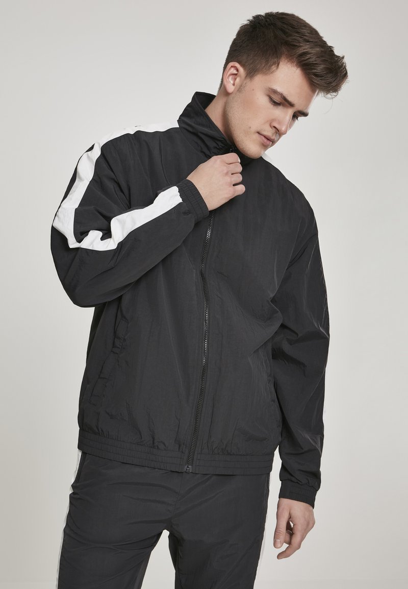 Urban Classics Giacca di mezza stagione in Blu | ABOUT YOU