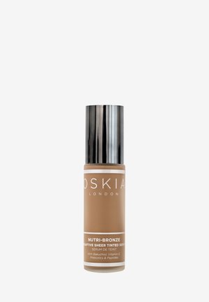 Oskia NUTRI-BRONZE ADAPTIVE SHEER TINTED SERUM - Sérum