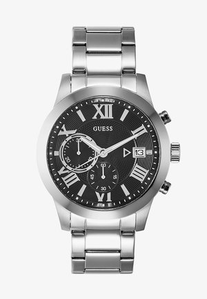 Roostevabast terasest kell musta tekstuuriga kellakoogiga. OmabROOMA numbreid, aladialee ja kuupäeva akent. Hõbedane viimistlus rihmal.