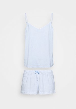 Prúžkovaná pyžamová súprava v svetlo modrej a bielej farbe, obsahujúca bezrúško top s tenkými ramienkami a zodpovedajúce šortky s elastickým pásom a detaily mašle.