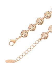 Bracciale dorato con perle sferiche decorate in filigrana e incastonate con pietre trasparenti, chiuso con un gancio a granchio e catena regolabile.