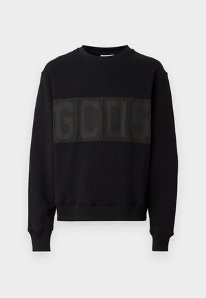 Schwarzer Sweatshirt mit Rundhalsausschnitt, ausgestattet mit einem strukturierten schwarzen Einsatz mit erhabener "GCDS" Schrift auf der Brust. Gerippte Bündchen und Saum.