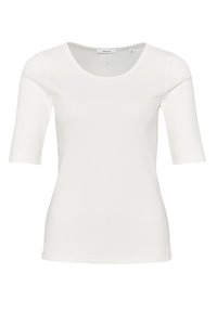 Vit kortärmad topp tillverkad av elastiskt material med rundad halsringning och figurnära siluett. Har en jämn yta med subtila sömdetaljer.