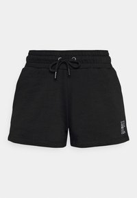 Černé bavlněné šortky s elastickým pasem na šňůrku, bočními kapsami a malým bílým logem na boku.