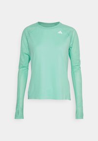 Mintgrön långärmad träningsskjorta i lätt material, med rund halsringning och texturerade detaljer på ärmarna. Vit logotyp på bröstet.