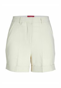 Skräddarsydda shorts i ljusbeige tyg, med hög midja, framfåll och uppvikta fållar. Klassisk design med sidfickor.