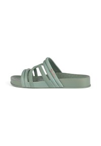 Green slide sandals with a textured outsole, wide strap design, and woven accents. Smooth finish with a slight platform height.