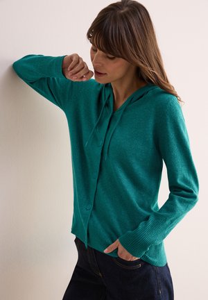 Teal gebreide cardigan met een capuchon, knopen sluiting en geribbelde manchetten. Zachte textuur, lichtgewicht materiaal en een ontspannen pasvorm.