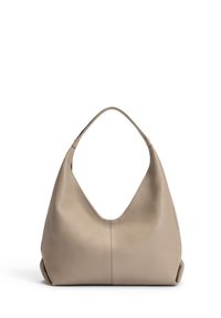 Beige leather hobo bag with a soft, textured finish, featuring a wide, curved handle and a seamless silhouette for a modern look.