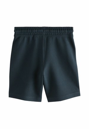 Dark green athletic shorts made of textured fabric with an elastic waistband and a subtle mesh pattern.
