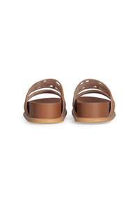 Brown block-heeled sandals featuring a cut-out strap design, smooth texture, and a solid, slightly elevated heel for added support.